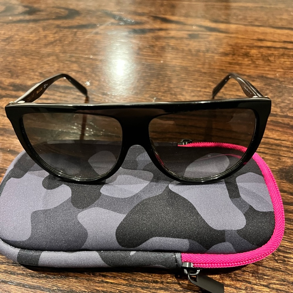 Celine’s all black. Used. Good condition.